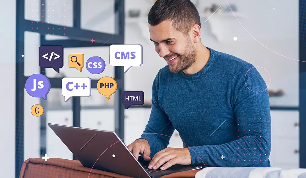 Web developer working on a laptop with programming language icons like JavaScript, HTML, CSS, PHP, and CMS.